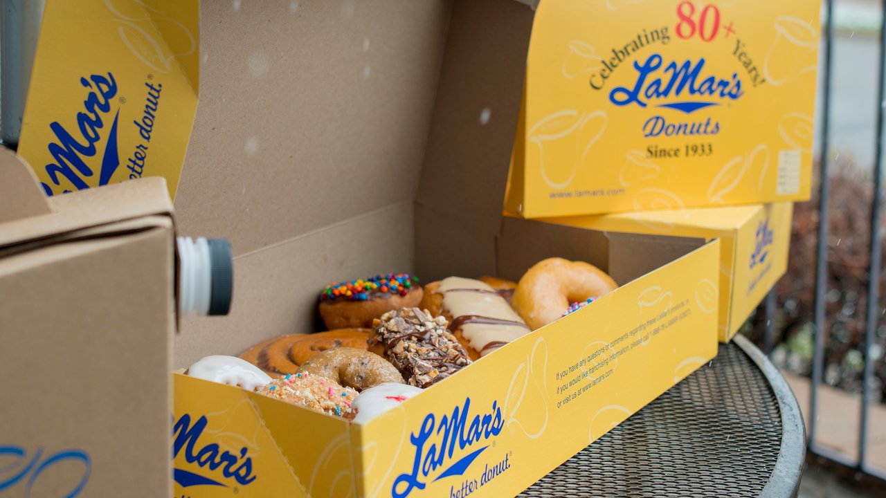 Close up box of LaMar's Donuts delivery | LaMar's Donuts and Coffee