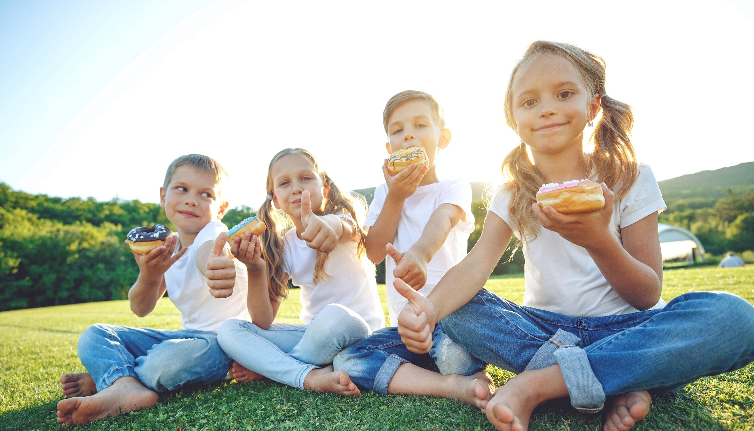 Kids enjoying LaMar's Donuts at Family Picnic | Online Pickup Ordering