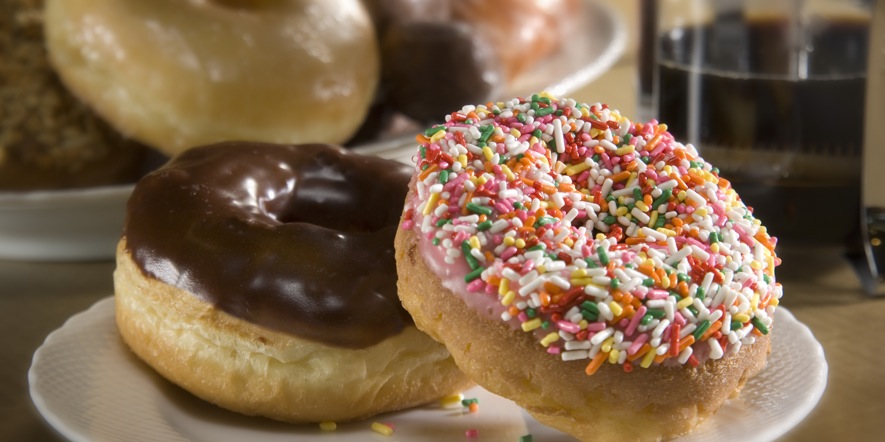 Chocolate & Rainbow Donut | Menu of Lamar's Donuts